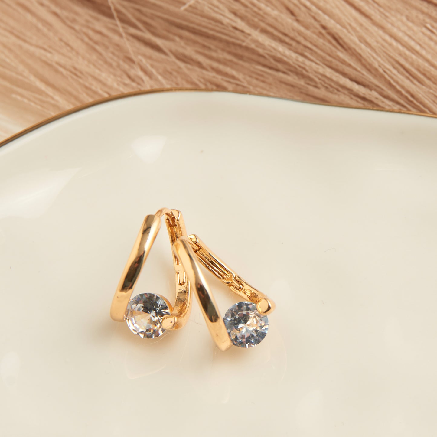 Dazzler Twisted Cubic Zirconia Hoop Earrings