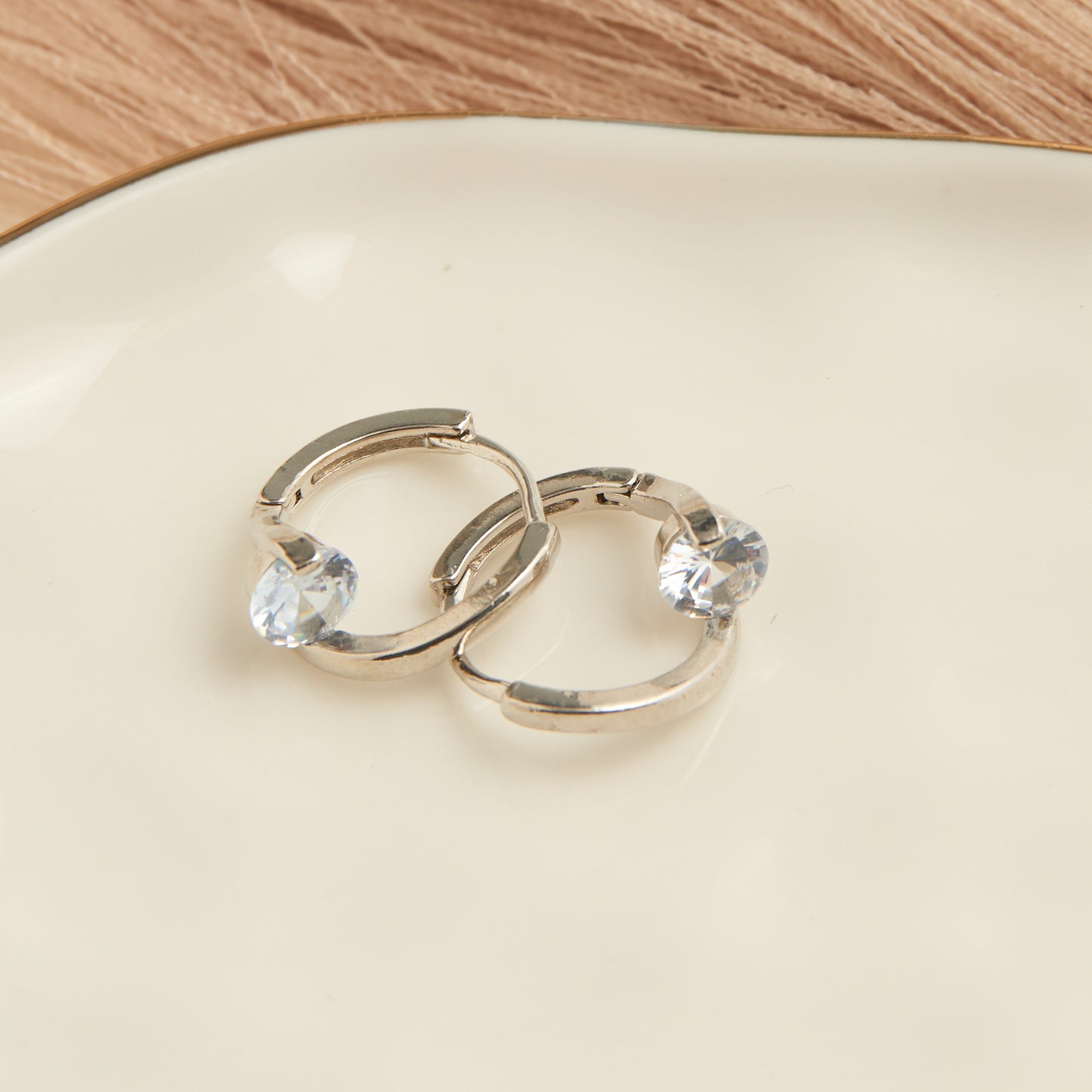 Dazzler Twisted Cubic Zirconia Hoop Earrings