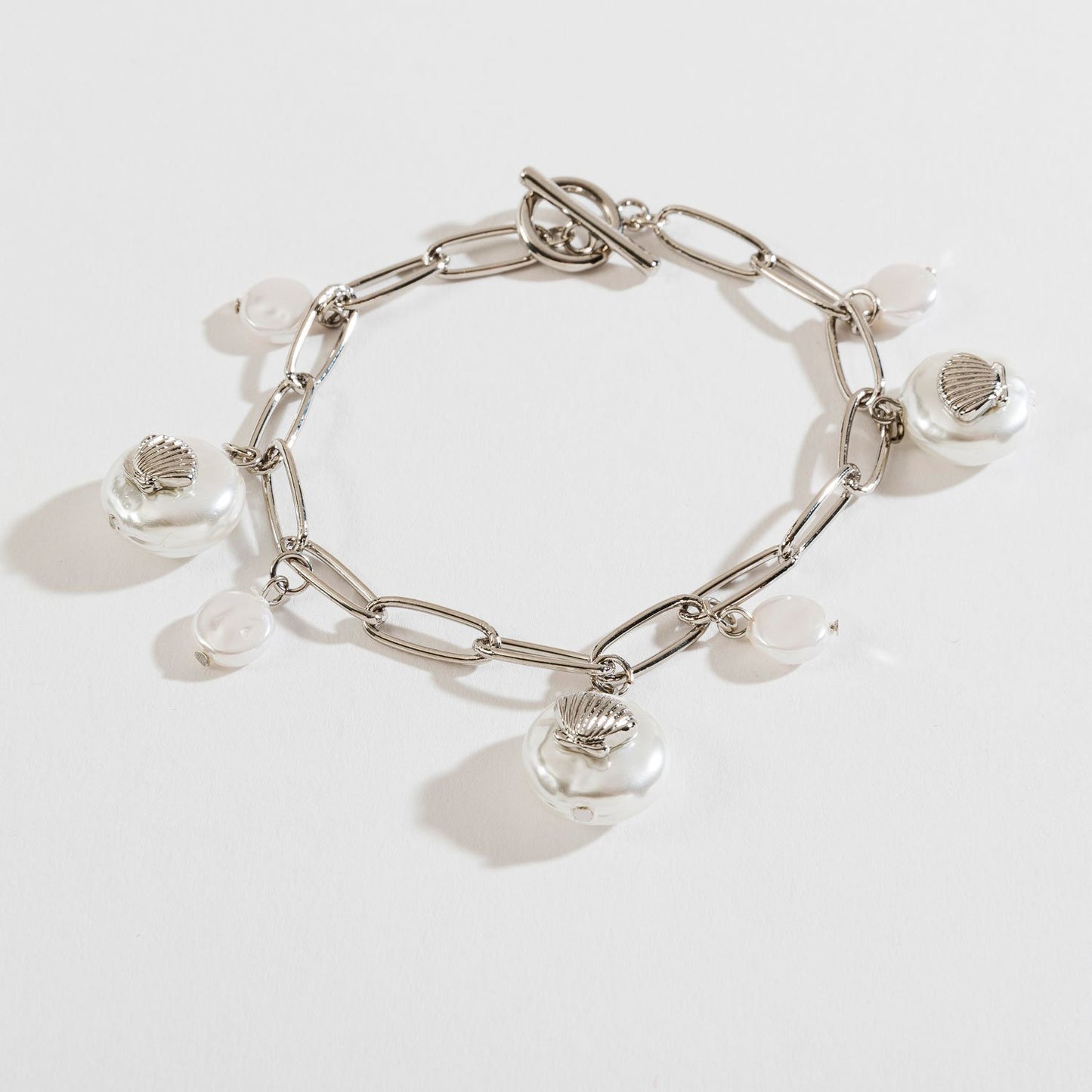 PEARL AND SHELL CHARM BRACELET