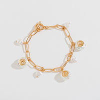 PEARL AND SHELL CHARM BRACELET