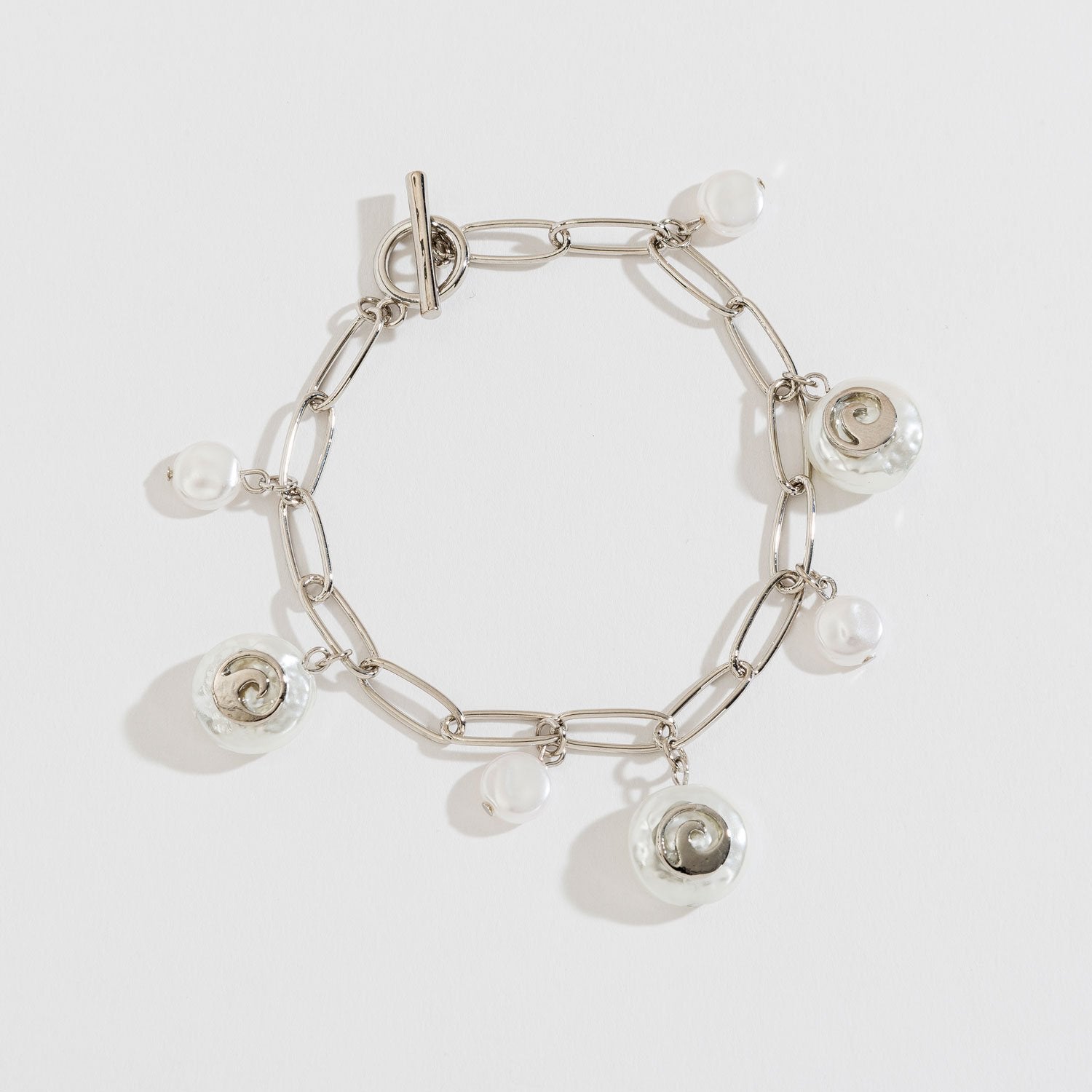 PEARL AND SHELL CHARM BRACELET