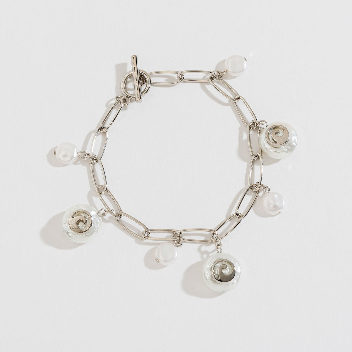 PEARL AND SHELL CHARM BRACELET