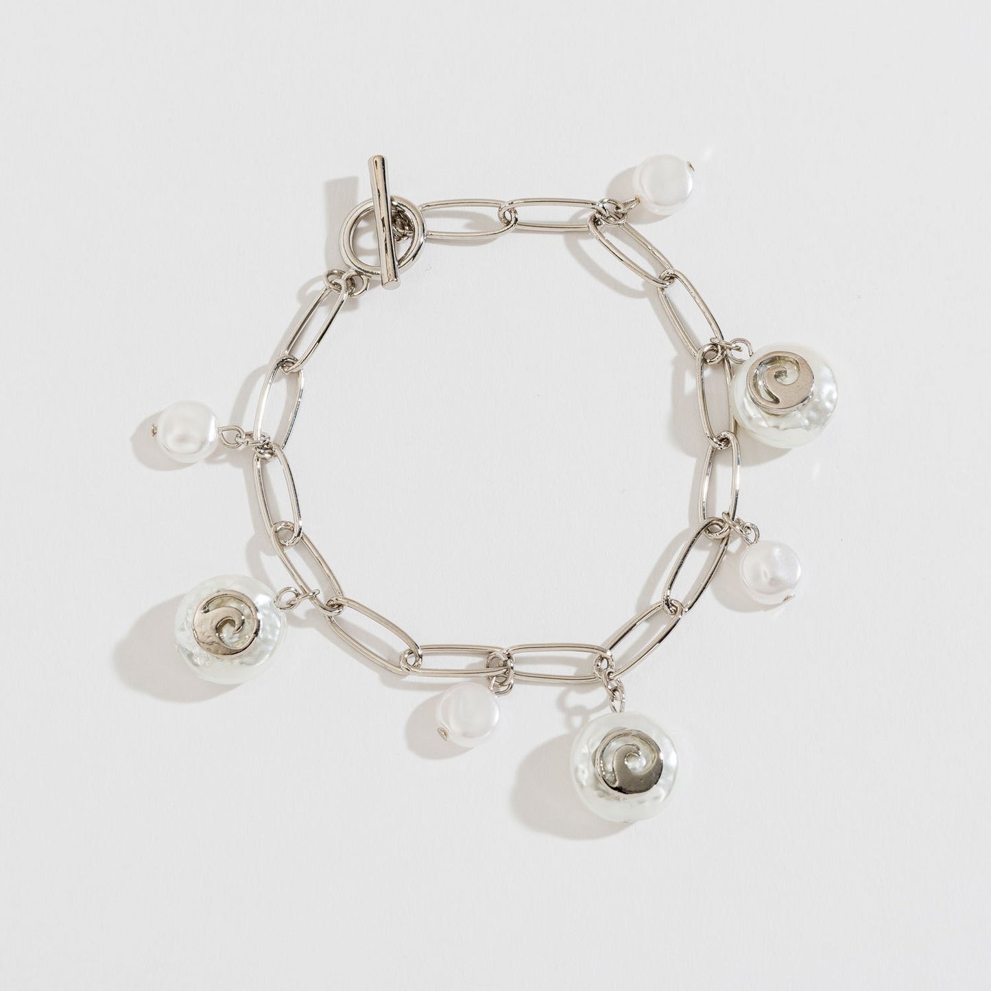 PEARL AND SHELL CHARM BRACELET