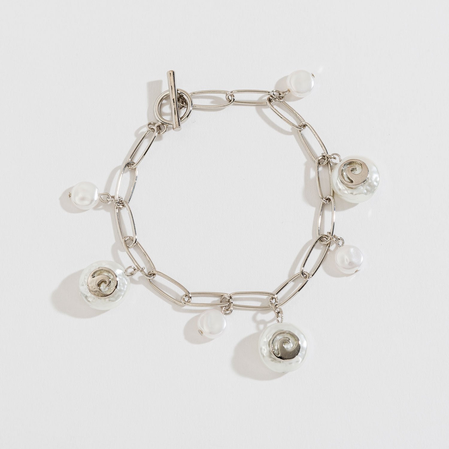 PEARL AND SHELL CHARM BRACELET